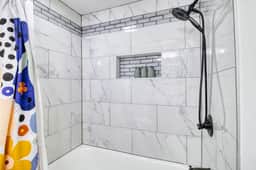 Enjoy a refreshing shower with plenty of space to relax and rejuvenate!