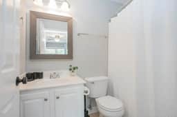 Enjoy the convenience of a clean, full bathroom with a bathtub, conveniently attached to the master bedroom.
