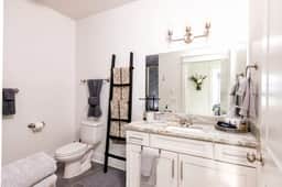 Indulge in the elegance of our first-floor full bathroom. Enjoy a refreshing shower in style with a breezy ambiance!