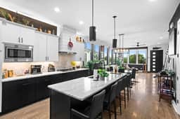 Pull up a seat at our kitchen counter with bar stools, offering added seating for a casual hangout or quick bites. Enjoy a comfortable and convenient spot for mingling and snacking!