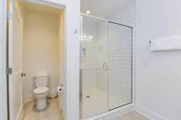 Gorgeous modern shower connected to bedroom 2 on the third floor. Experience all the top notch amenities you deserve on your Nash vacation!