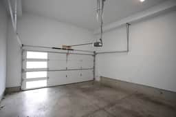 Two-car garage and parking for an extra car right outside the garage!