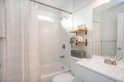 Luxuriate in relaxation! Our bathroom presents a choice of shower or bath, immaculately clean and supplied with essential toiletries and soft towels for your utmost comfort!