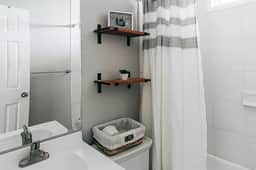 The bathrooms are equipped with everything you need for a comfortable stay. Their design prioritizes your comfort and functionality.
