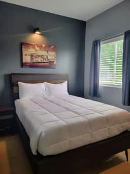 Indulge in luxury in Unit A's master bedroom. Unwind in a Queen bed, and enjoy personal TV entertainment with Hulu and Netflix to enhance your experience!