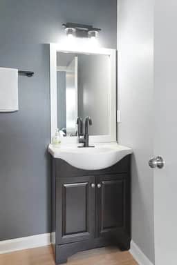 Unit A's bathroom - arranged with fresh towels and essential amenities.