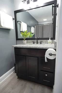 Unit B, Bathroom 2: Elevate your self-care routine amidst elegant surroundings.