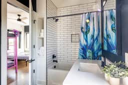 Immerse yourself, refresh, and cool off in this full bathroom featuring a soothing tub designed for ultimate relaxation!