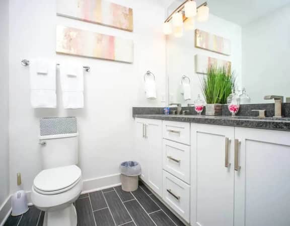 Indulge in the stunning Master bathroom, complete with his and her sinks. Elevate your vacation with top-notch amenities that redefine relaxation. Immerse yourself in elegance and enjoy a getaway that's designed to exceed your every expectation!