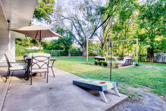 Have a blast with a fun outdoor game in the backyard, a space built for laughter and connection!