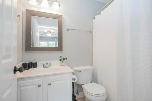 Enjoy the convenience of a clean, full bathroom with a bathtub, conveniently attached to the master bedroom.