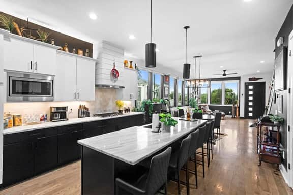 Pull up a seat at our kitchen counter with bar stools, offering added seating for a casual hangout or quick bites. Enjoy a comfortable and convenient spot for mingling and snacking!