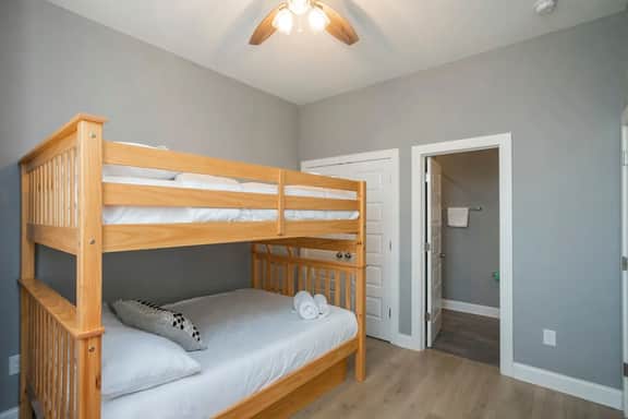 Bedroom 3 (First floor): Indulge in comfort and convenience with cozy mattresses. Easy access for a restful night's sleep!