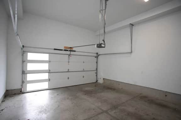 Two-car garage and parking for an extra car right outside the garage!