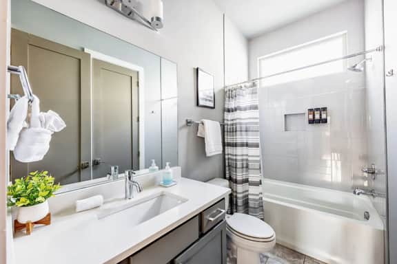 Elevate your stay with this full bathroom on the second floor, featuring a relaxing bathtub for your utmost comfort!