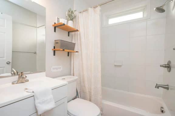 Indulge in comfort! Our bathroom offers both shower and tub options, meticulously clean and stocked with bath essentials and plush towels!