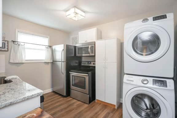 Make great meals a priority! Our well-stocked kitchen guarantees tasty homemade dishes before you set out to explore the city. Enjoy complimentary use of our in-unit washer and dryer conveniently situated in the kitchen!