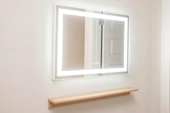 Just outside the master bedroom, you'll find a makeup station—ideal for prepping before a night out! This well-lit space provides the perfect spot to perfect your look!