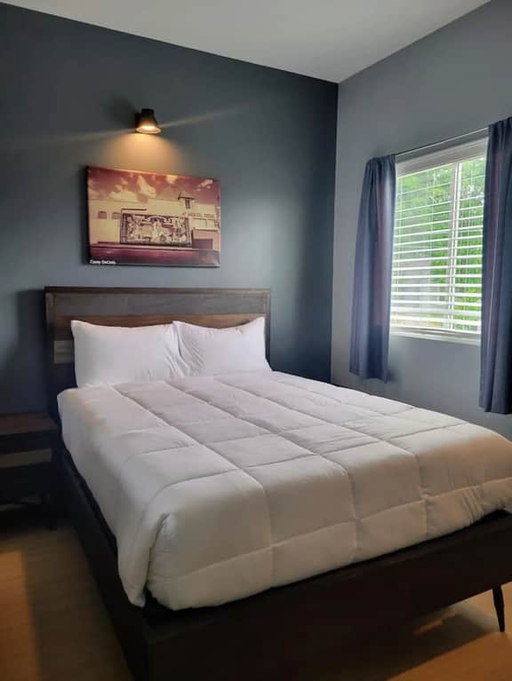 Indulge in luxury in Unit A's master bedroom. Unwind in a Queen bed, and enjoy personal TV entertainment with Hulu and Netflix to enhance your experience!