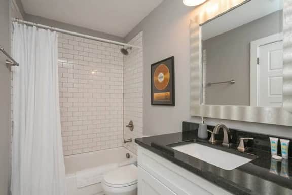 Experience convenience and privacy in this attached full bathroom on the third floor. Perfectly situated for Bedroom 3, it's a private haven for comfort. Enjoy the luxury of an en-suite bath, adding a touch of elegance to your daily routine!