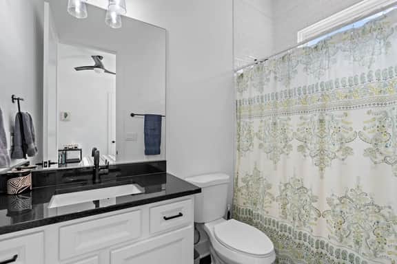 Sleek and refreshing, with modern fixtures and bright finishes, ideal for quick showers before heading out on the town.