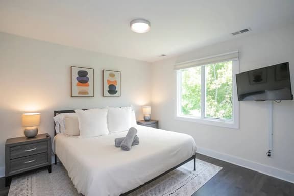 Each bedroom is expertly furnished and features it's own television!