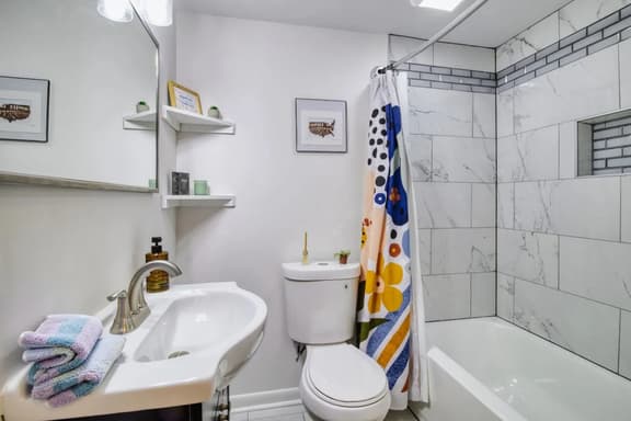 Relax in the shower and bathtub combo, offering a soothing space to unwind!