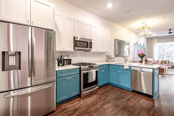 Chic and functional, the open kitchen is fully equipped and ready with everything you need to keep the fun going.