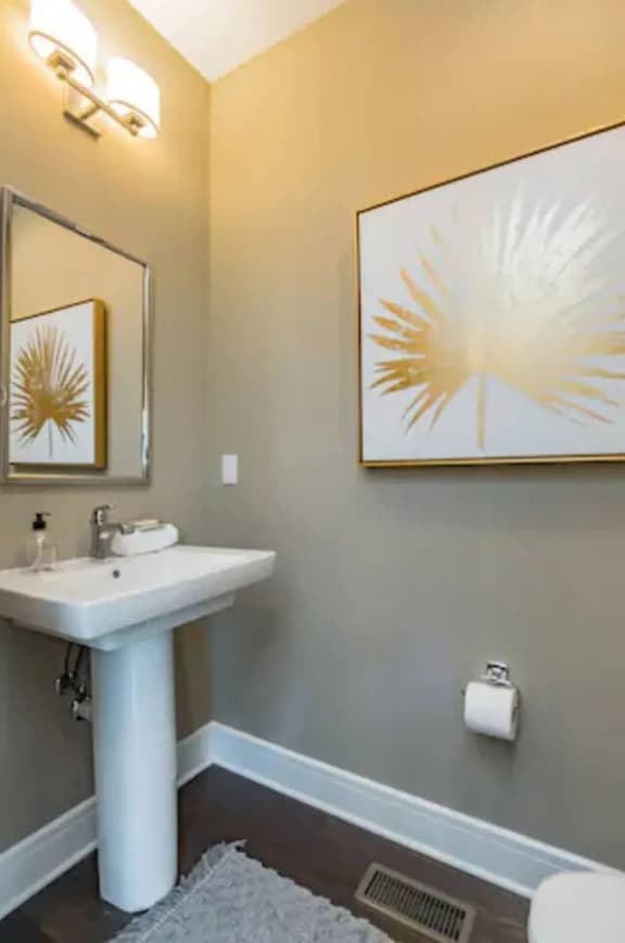 Beautiful half bath on the second floor for your convenience