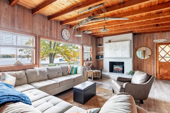 Comfort abounds in our living room.  Plenty of seating space and plump, comfortable sofas await. Gather, relax, and make memories in style!