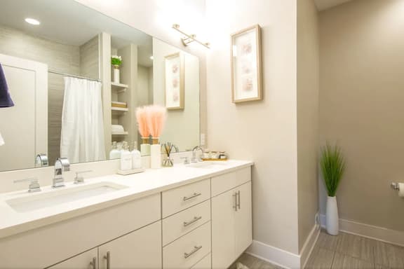 This sophisticated full bath with his and her sinks is connected to the Master bedroom on the third floor!