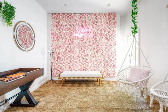 Game/lounge room with its beautifully decorated wall!